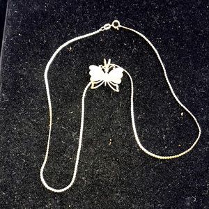 Stealing silver butterfly and necklace